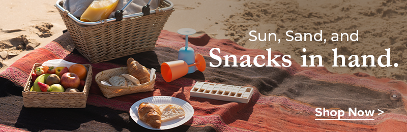 Sun, Sand, And Snacks In Hand.
